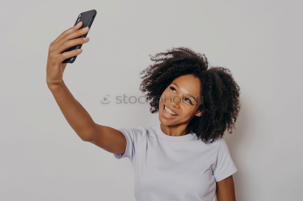 Similar – Image, Stock Photo Young casual woman using her smartphone