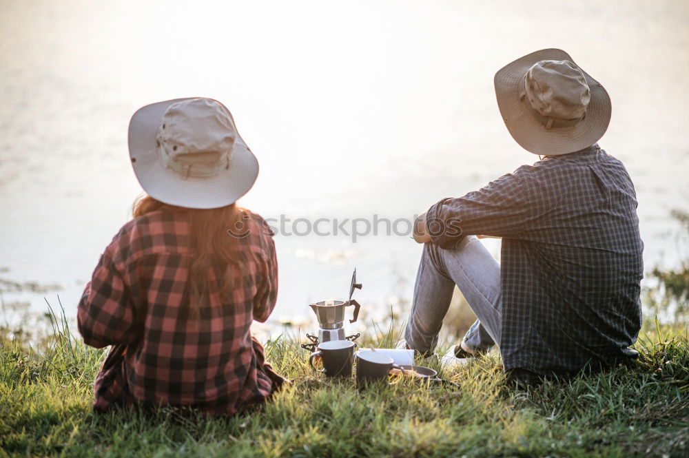 Similar – Image, Stock Photo Happy young adult couple with cute puppy