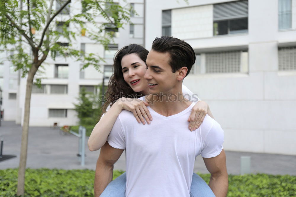 Similar – Image, Stock Photo Young couple walking through the city