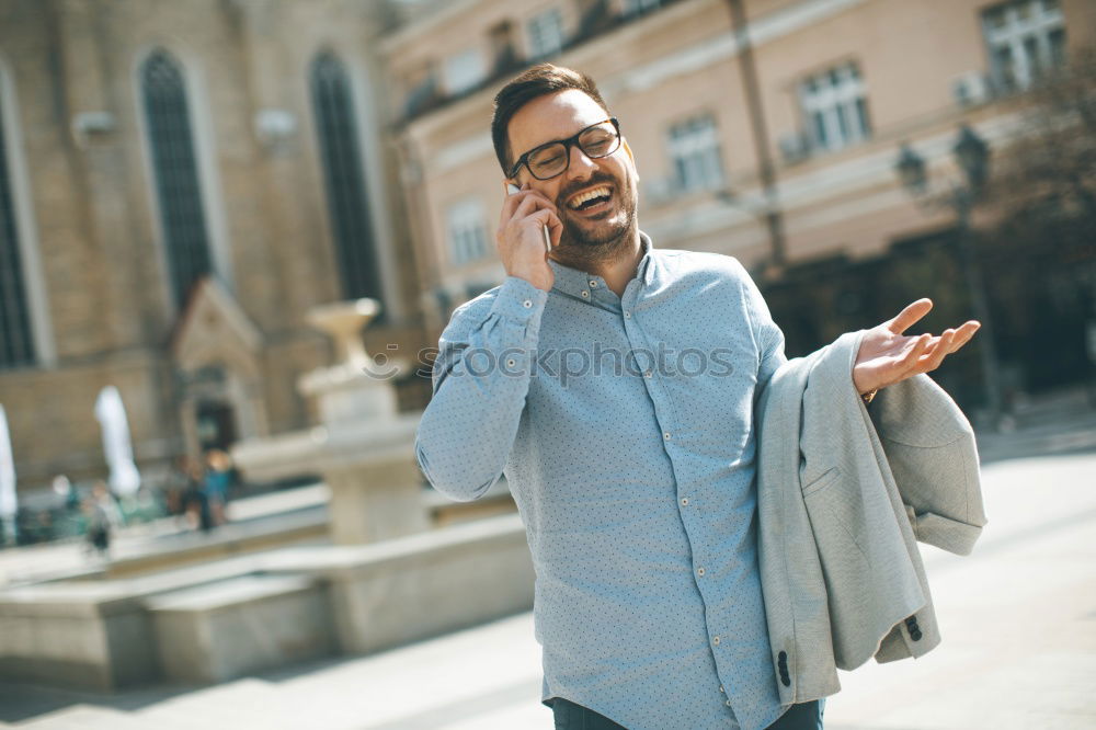 Similar – Traveler using smartphone on city