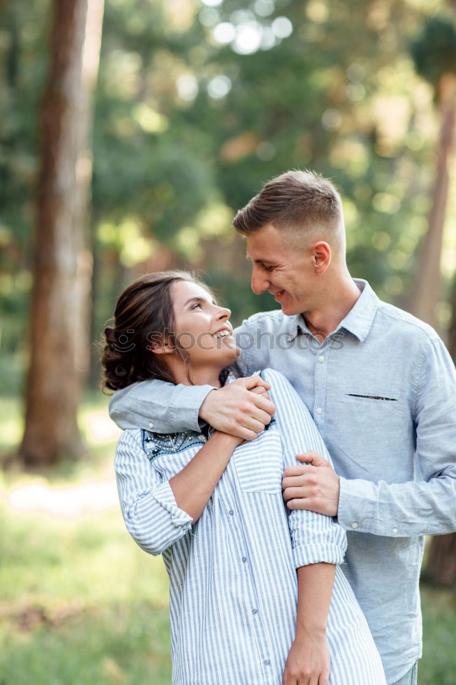Similar – Image, Stock Photo Smiling couple of lovers having fun.