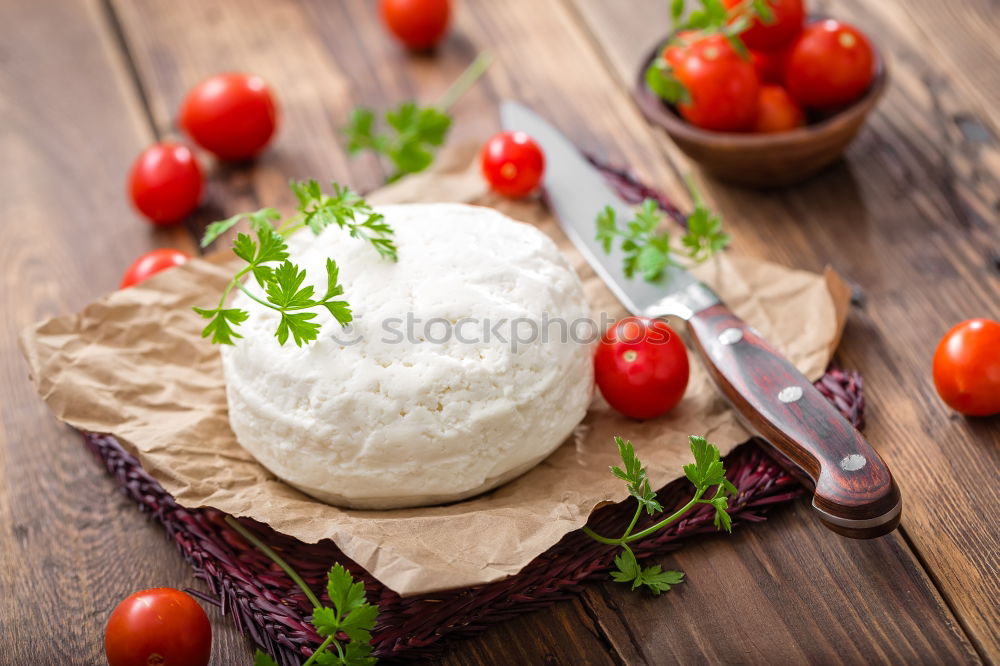 Similar – Italian cheese burrata, tomatoes, basil and bread