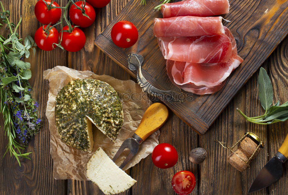 Similar – Italian meat platter with antipasti and ciabatta bread