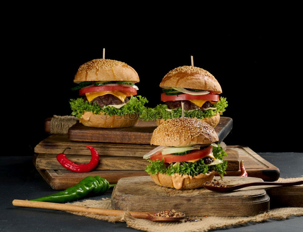 Image, Stock Photo three hamburgers with vegetables