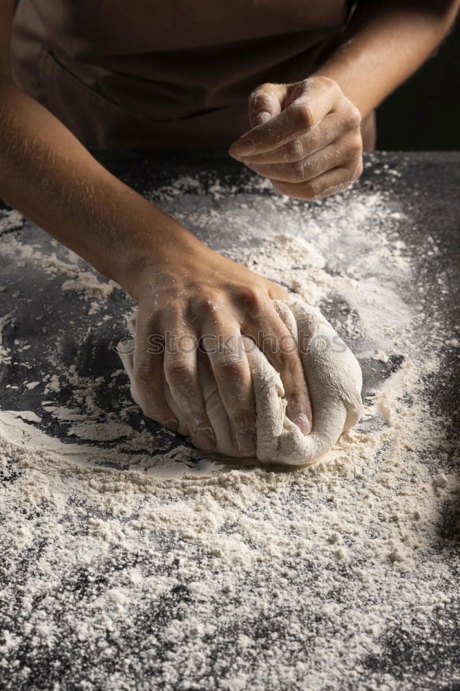 Similar – Image, Stock Photo male hands substitute white wheat flour dough