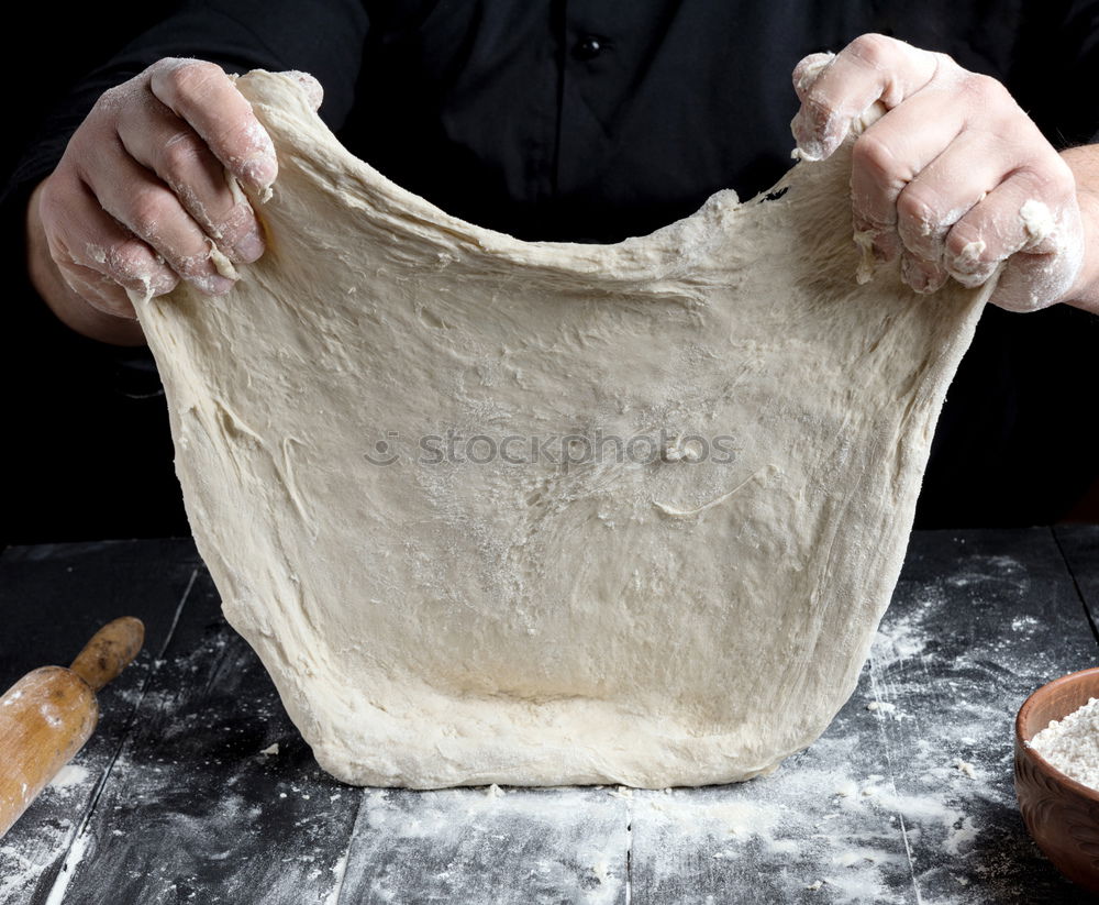 Image, Stock Photo Chef in black jacket, kneads dough