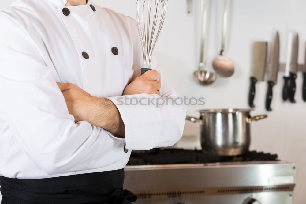 Similar – Young couple cooking. Man and woman in their kitchen