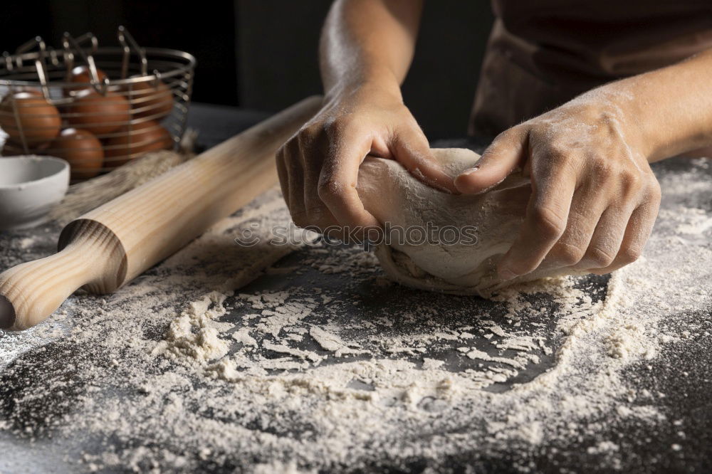 Similar – Image, Stock Photo spoon with white wheat flour in the male hands of a cook