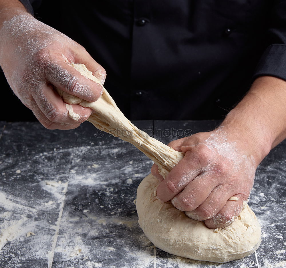 Similar – Image, Stock Photo spoon with white wheat flour in the male hands of a cook