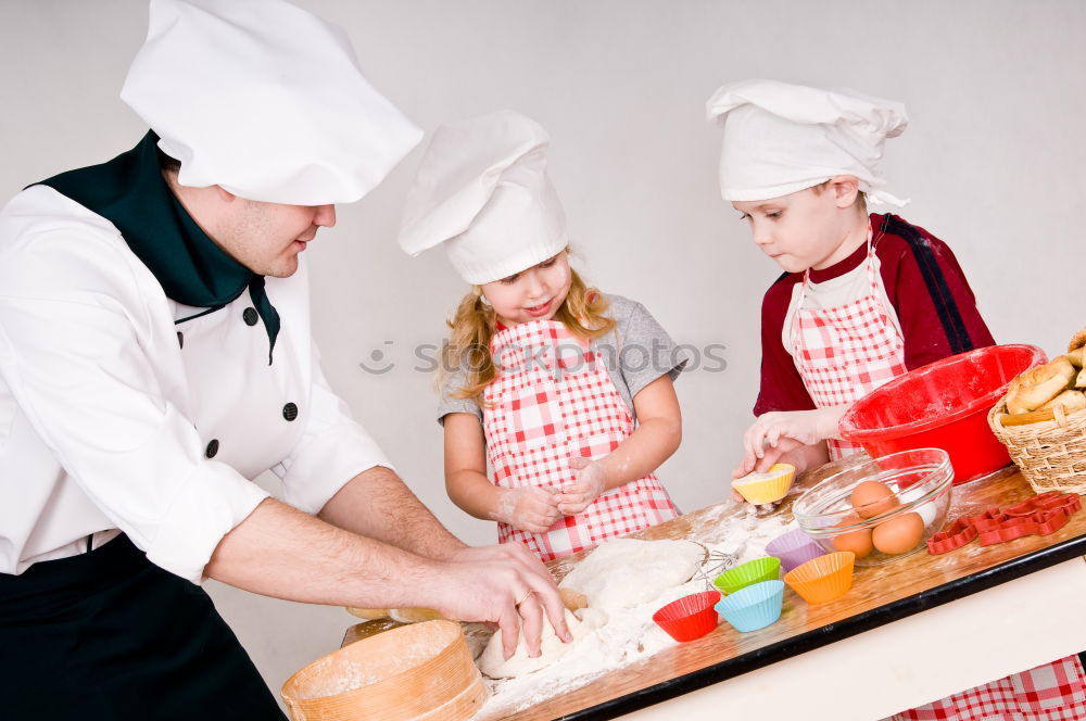 Similar – Grandfather With Grandson with cook hat and mustache on gray background