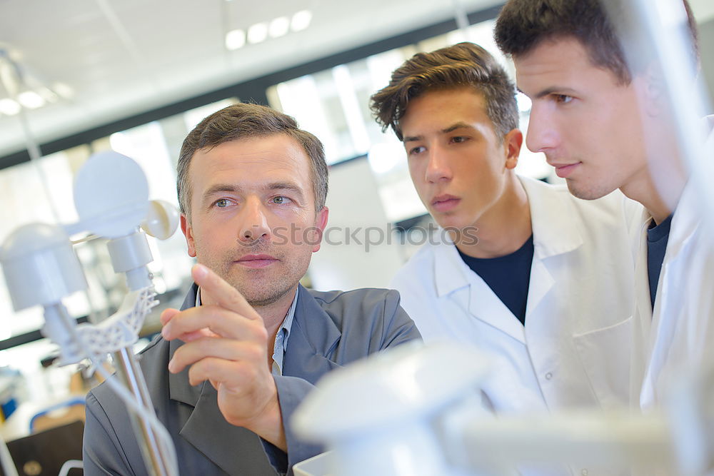 Similar – Image, Stock Photo Workers communicating in lab