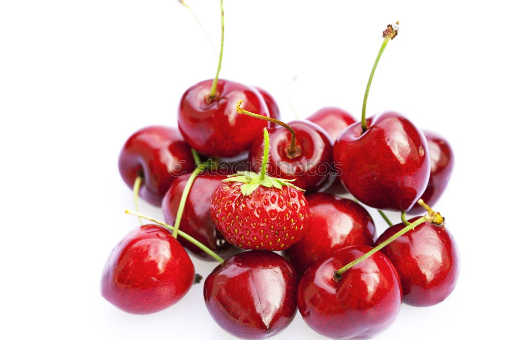 Similar – freshly picked red currants lie in a glass bowl on a red and white chequered tablecloth