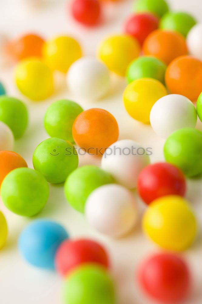 Similar – Image, Stock Photo Colorful jelly beans of different sizes close to wallpaper