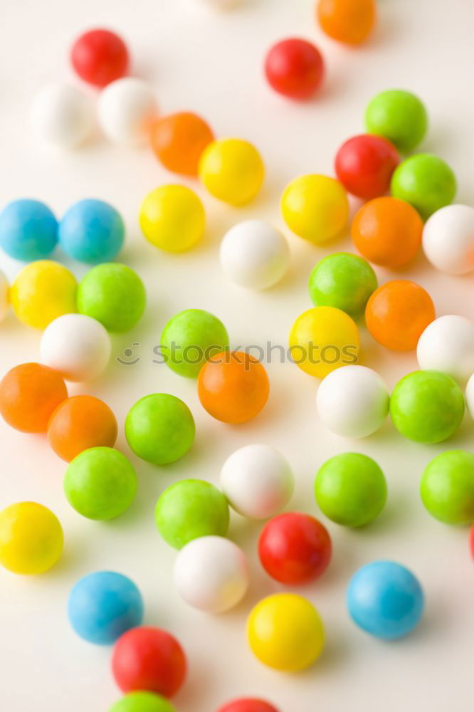 Similar – Image, Stock Photo Colorful jelly beans of different sizes close to wallpaper