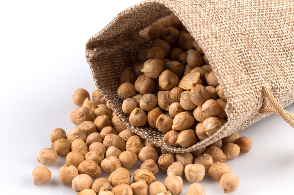 Similar – Soy beans in a sack on wooden table