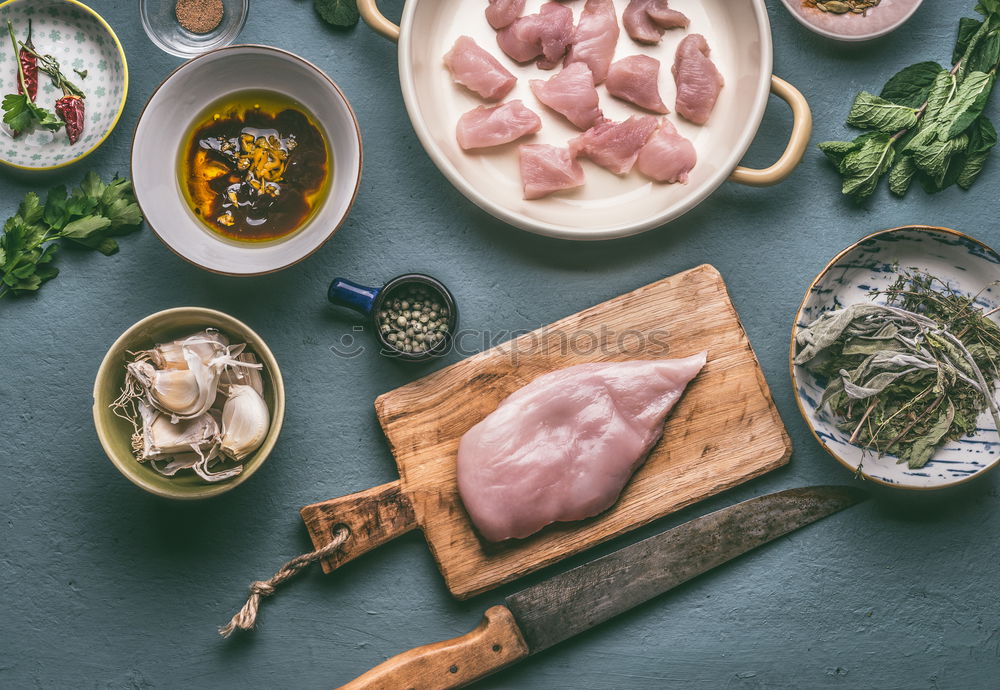 Similar – Image, Stock Photo Female hands marinate chicken fillet