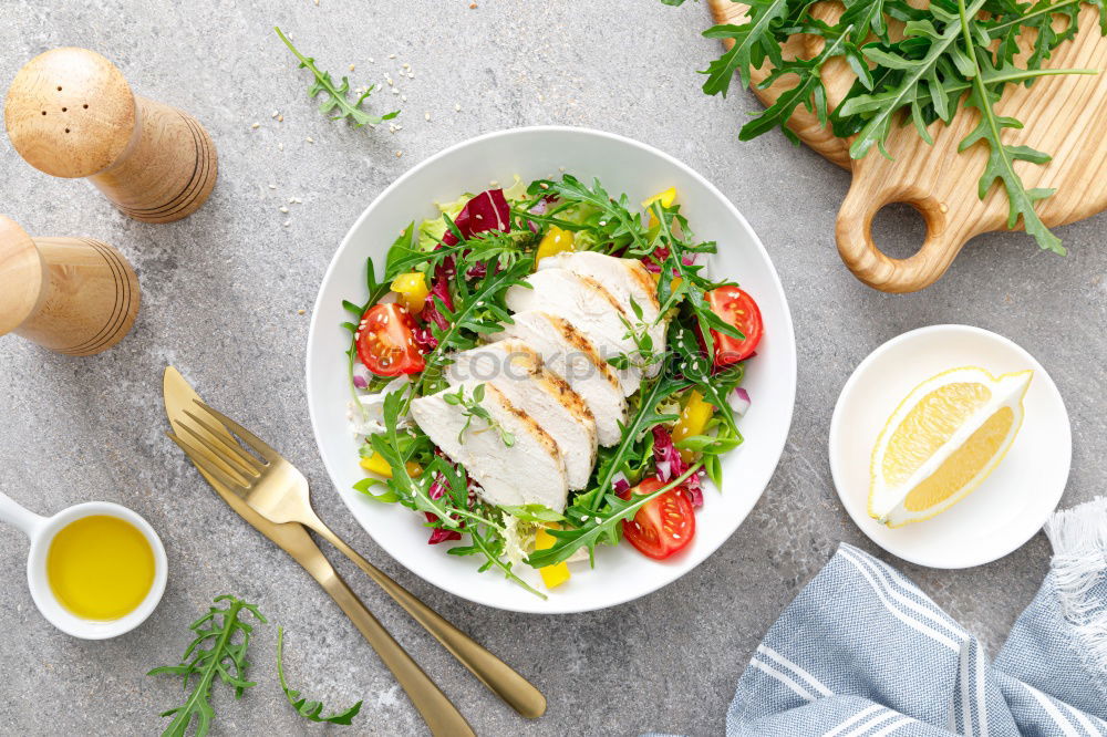 Similar – Image, Stock Photo Chicken salad with green mixed salad leaves