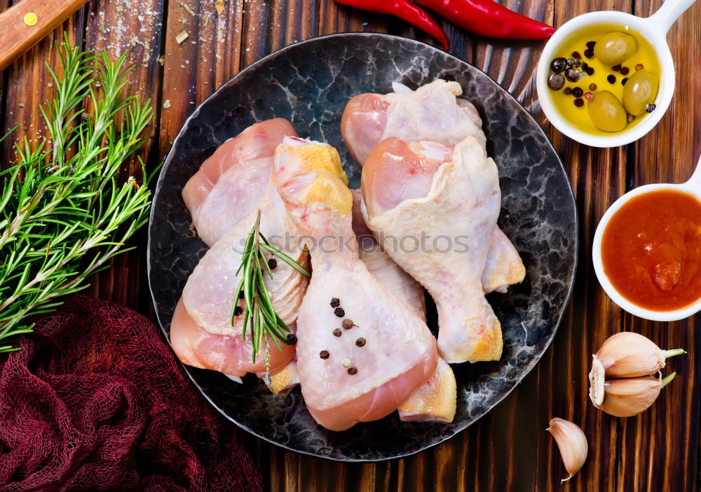 Similar – Chicken thigh with olive oil, honey, herbs and lemon