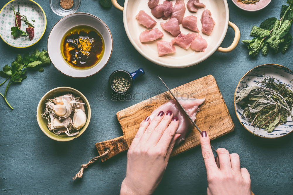 Image, Stock Photo Female hands marinate chicken fillet