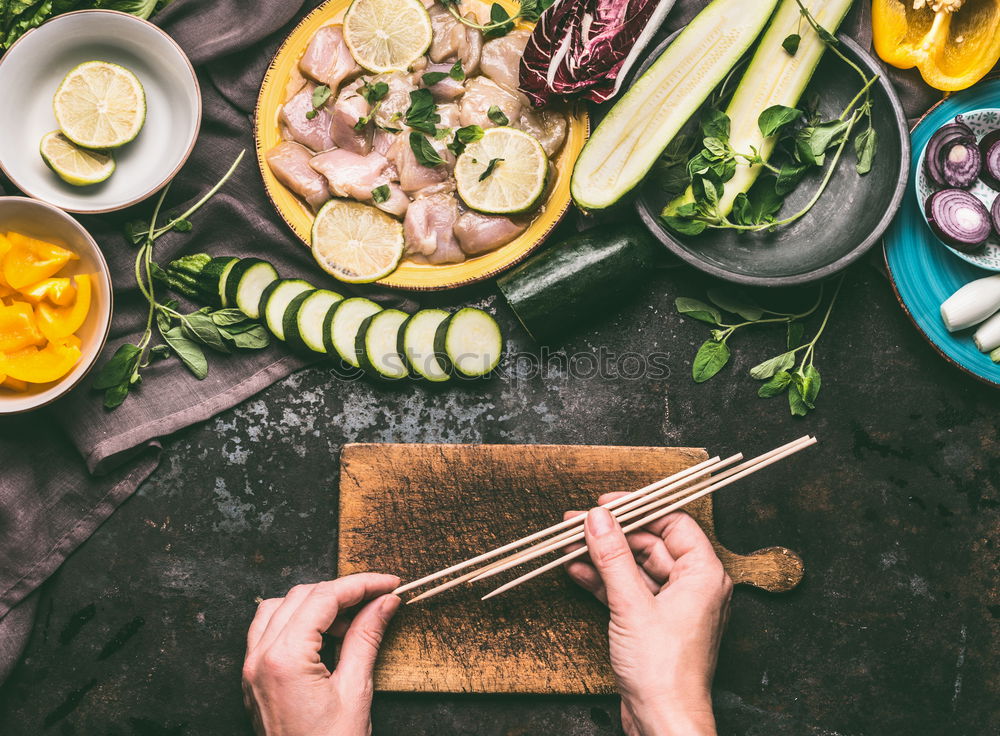 Similar – Image, Stock Photo Female hands marinate chicken fillet