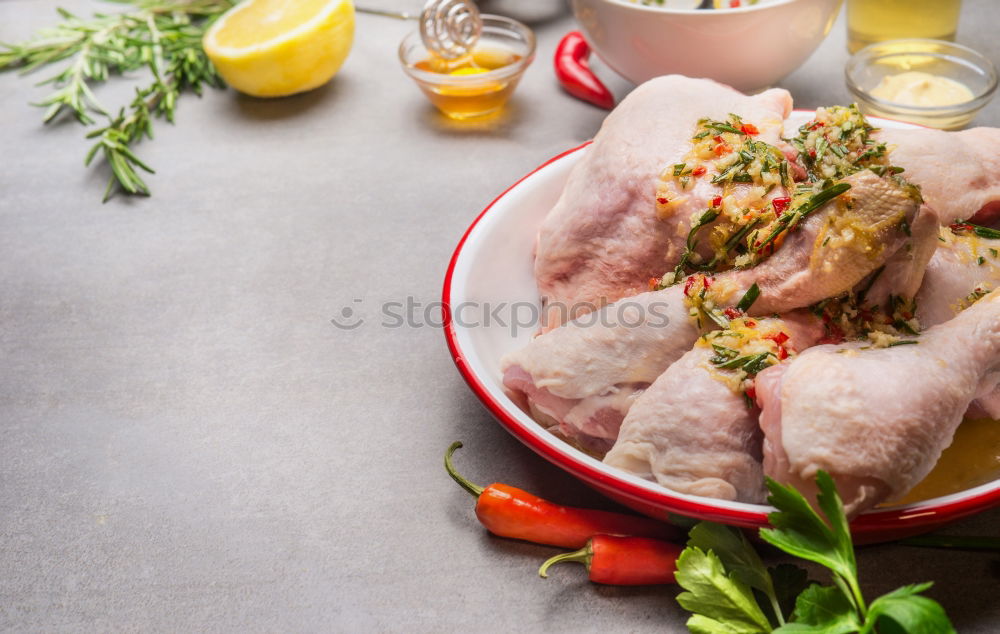 Similar – Chicken thigh with olive oil, honey, herbs and lemon