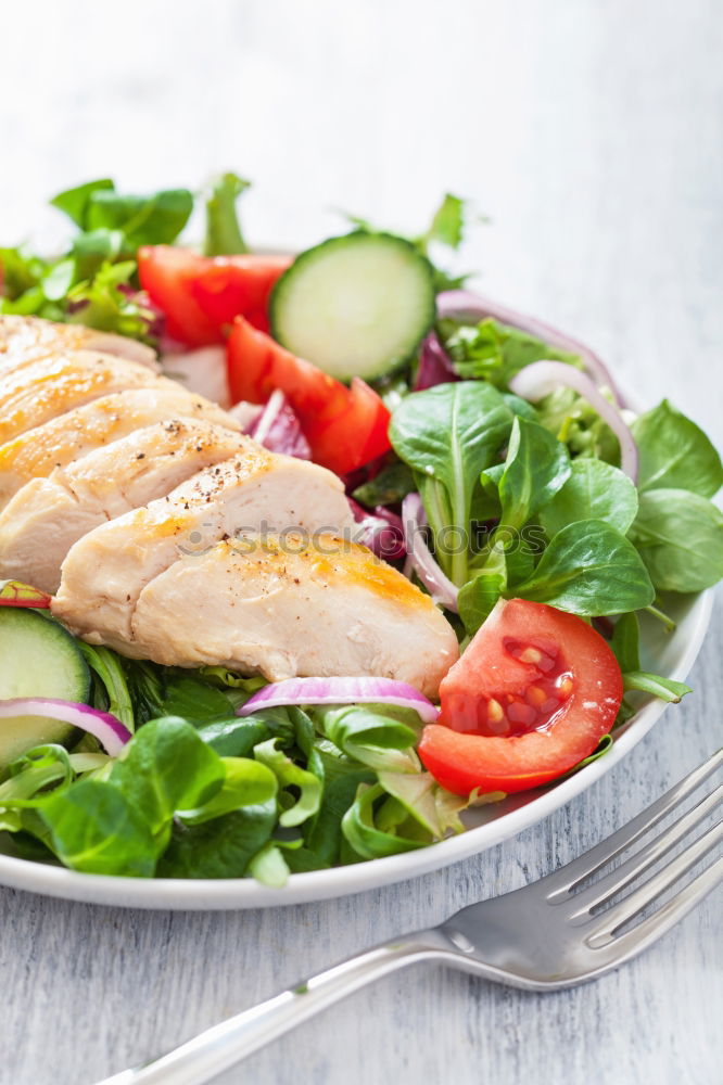 Similar – Image, Stock Photo Vegan tofu salad with tomatoes and lamb’s lettuce in bowl