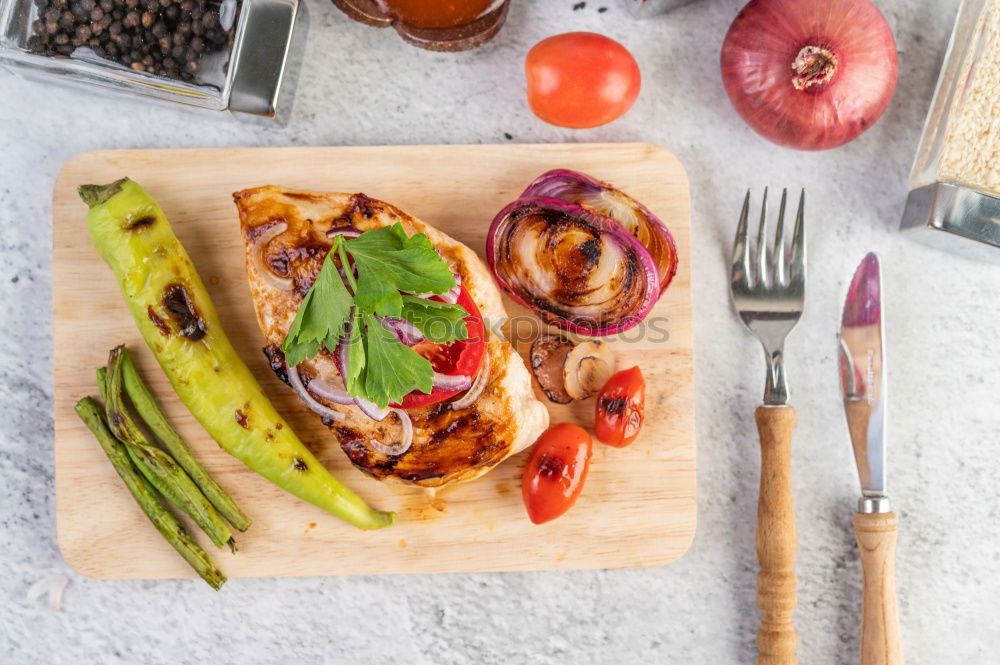 Fish baked with vegetable garnish