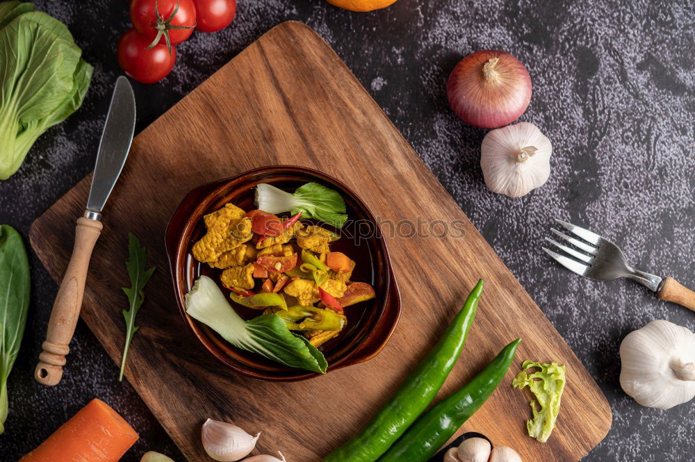 Similar – Image, Stock Photo vegetables in a black round frying pan