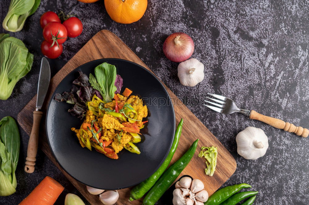 Similar – vegetables in a black round frying pan