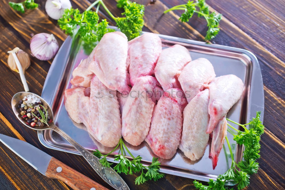 Similar – Image, Stock Photo Raw chicken legs with mushrooms, spices and herbs