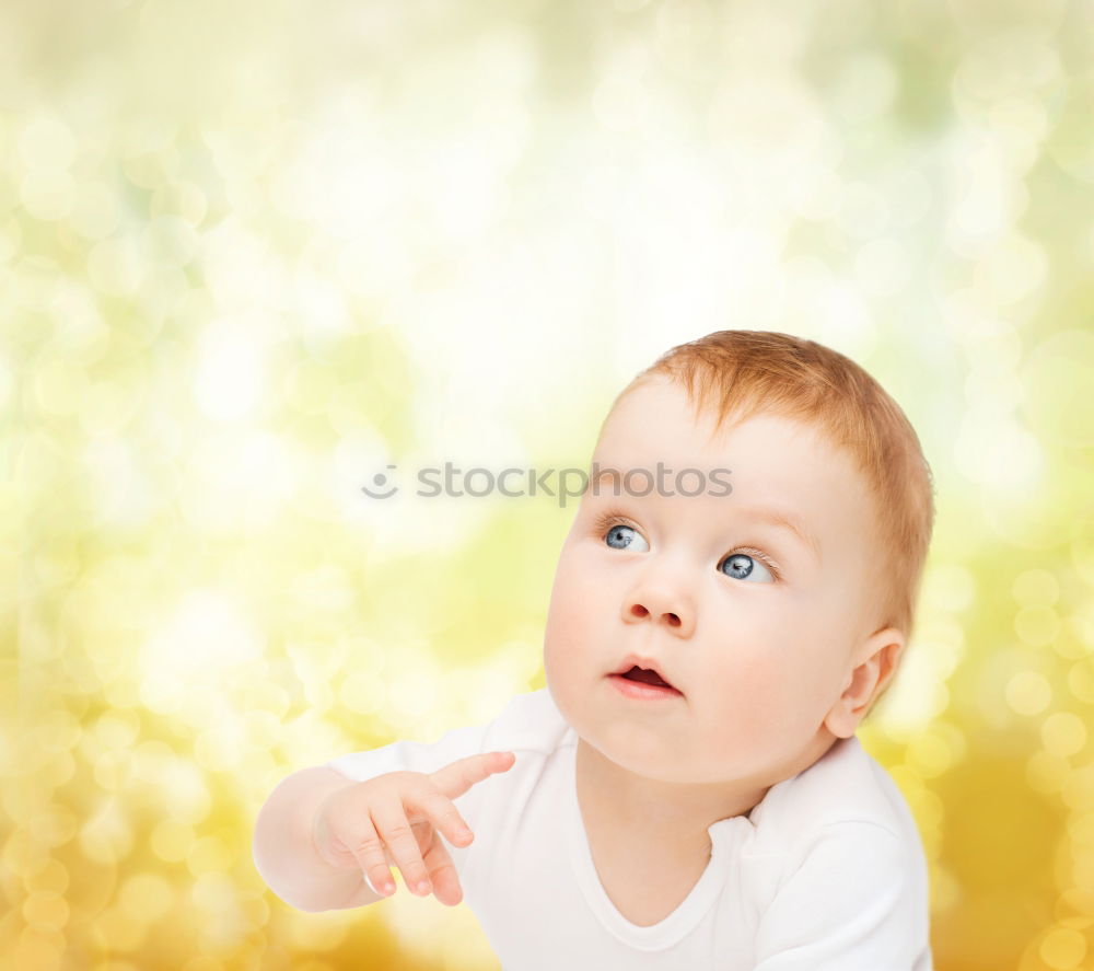 Similar – Image, Stock Photo An unfocused portrait of a blue-eyed baby, hugging its mother, who is holding it in her arms