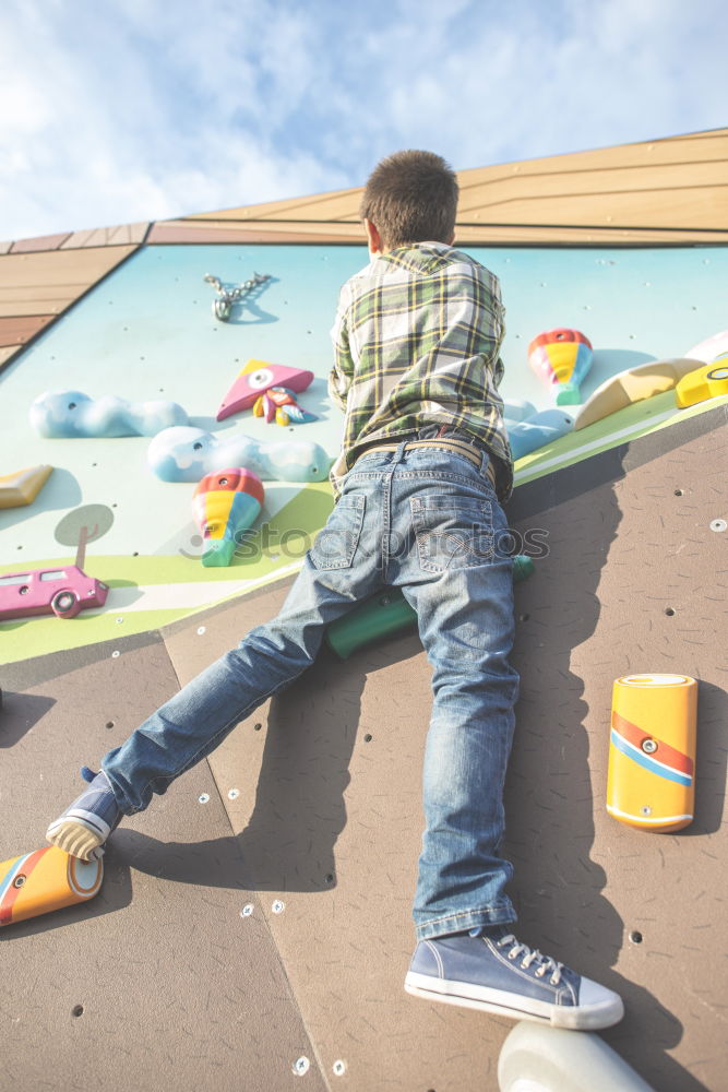 Similar – Image, Stock Photo Child climb a climbing wall