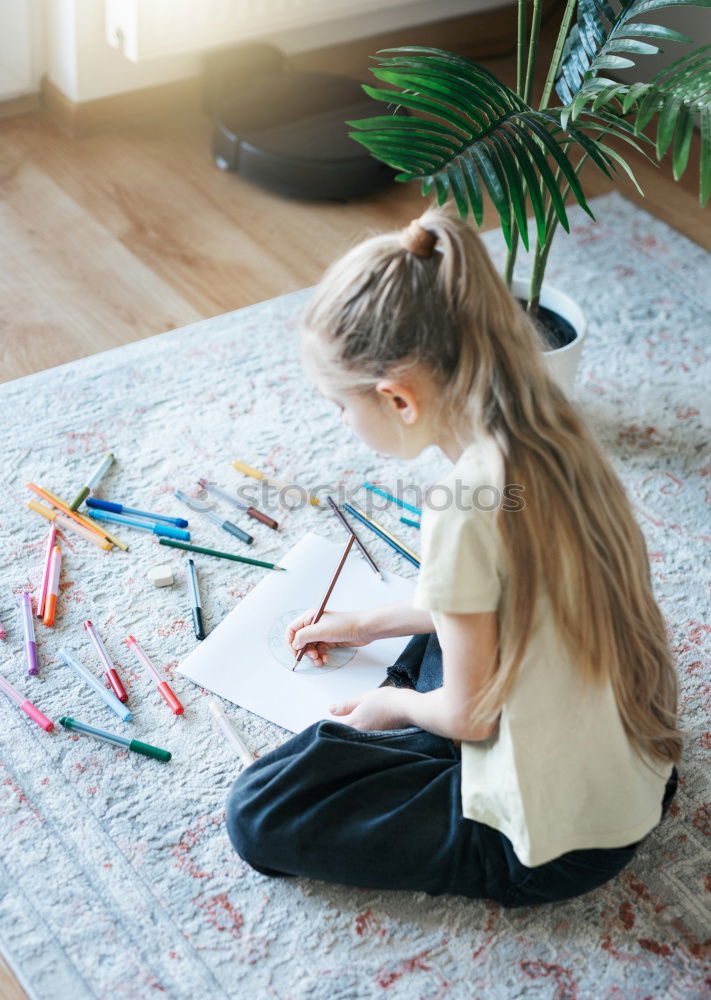 Similar – Image, Stock Photo Little girl doing homework on bed at home