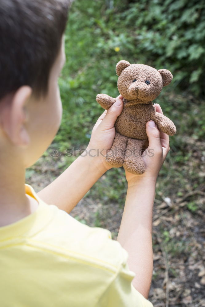 Image, Stock Photo Child hold teddy Playing
