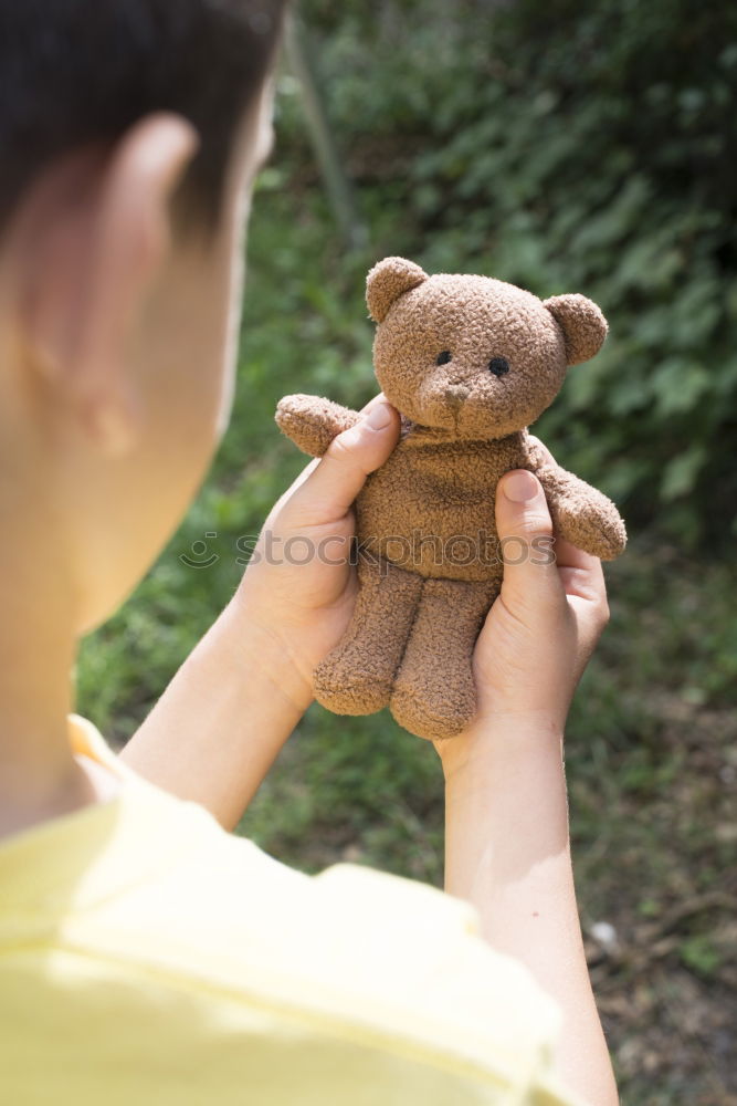 Image, Stock Photo Child hold teddy Playing