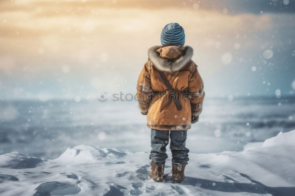 Similar – Woman walking outdoors on sunny snowy day in winter