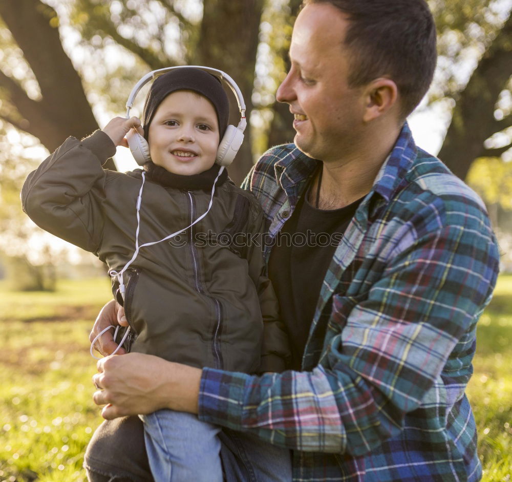 Similar – young dad and son playing outdoors at sunset. family concept