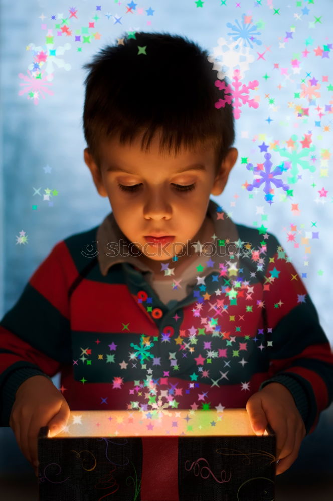 Similar – Child stands in a shower of confetti