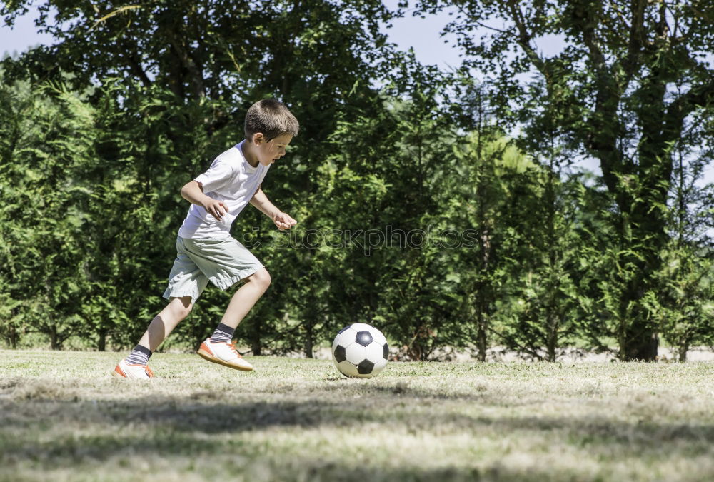 Similar – Kids Play Soccer, Boy, Girl, Goal