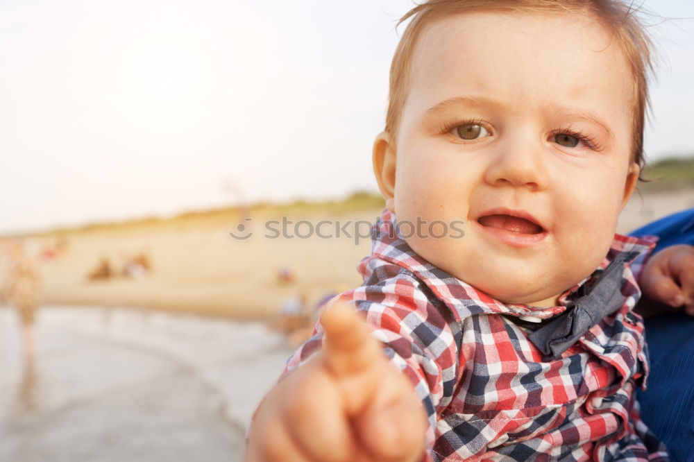 Similar – Image, Stock Photo Mother and son playing on the beach at the day time.