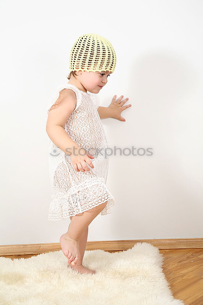 Similar – Cute Baby Girl Lying in the Crib