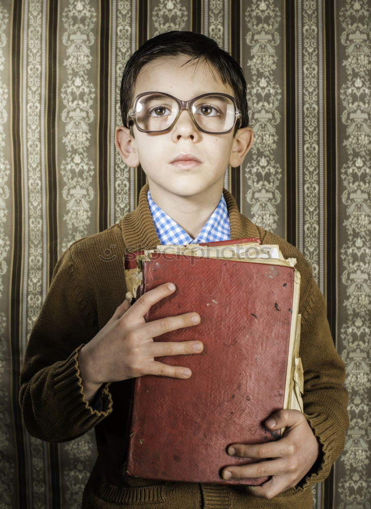 Similar – Image, Stock Photo One little boy reading to robot from cardboard boxes outdoors. Concept of science and education.