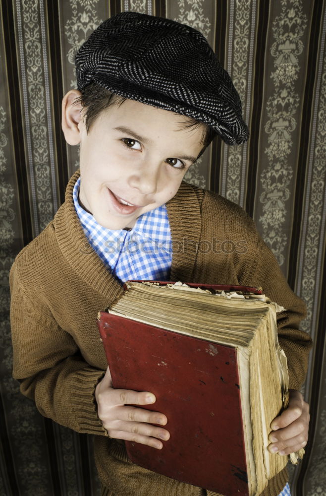 Similar – Image, Stock Photo Handsome elegant young fashion man in trendy costume suit, old door wooden background