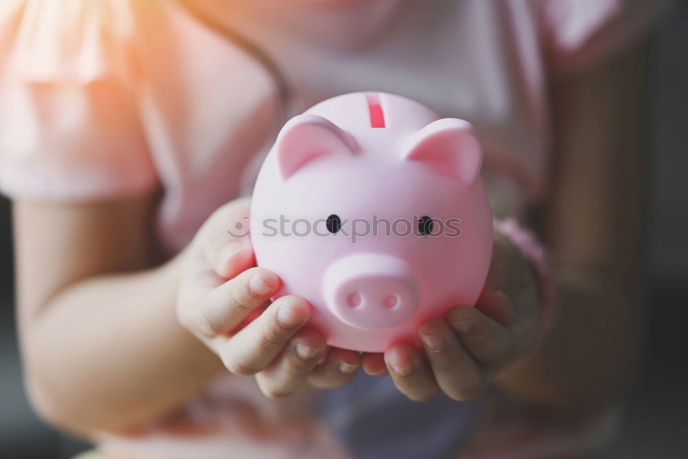 Similar – Image, Stock Photo Black woman with saving piggy bank