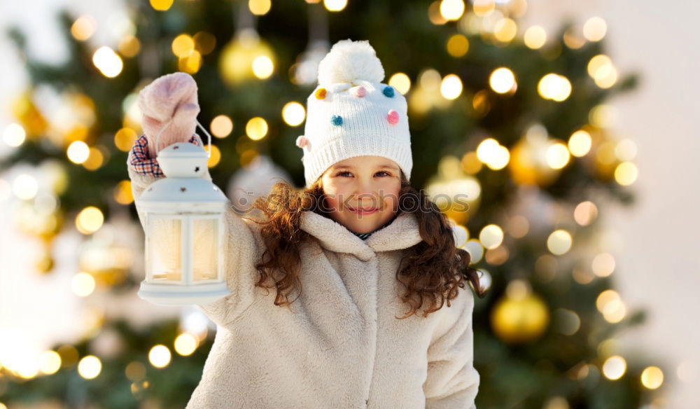 Similar – Image, Stock Photo christmas portrait of happy child girl holding burning sparkler