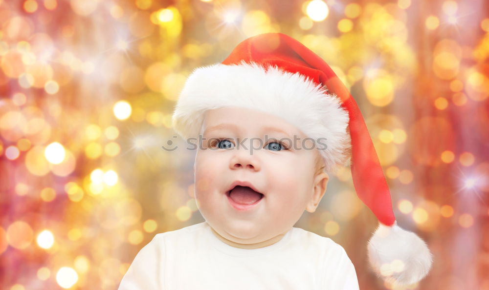 Similar – Adorable kid with Santa´s hat on Christmas day.