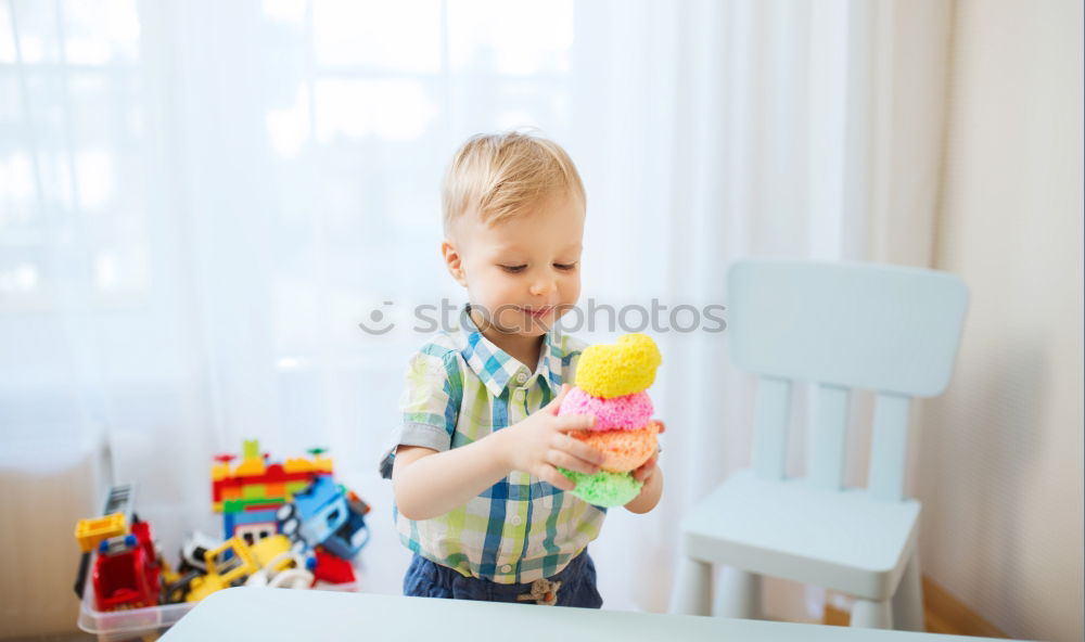 Similar – Image, Stock Photo Little kid on Christmas day on the bed with a gift