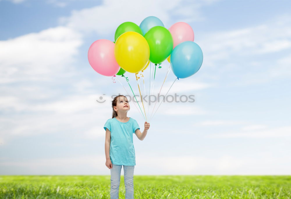 Similar – Image, Stock Photo Hand holding ballooons