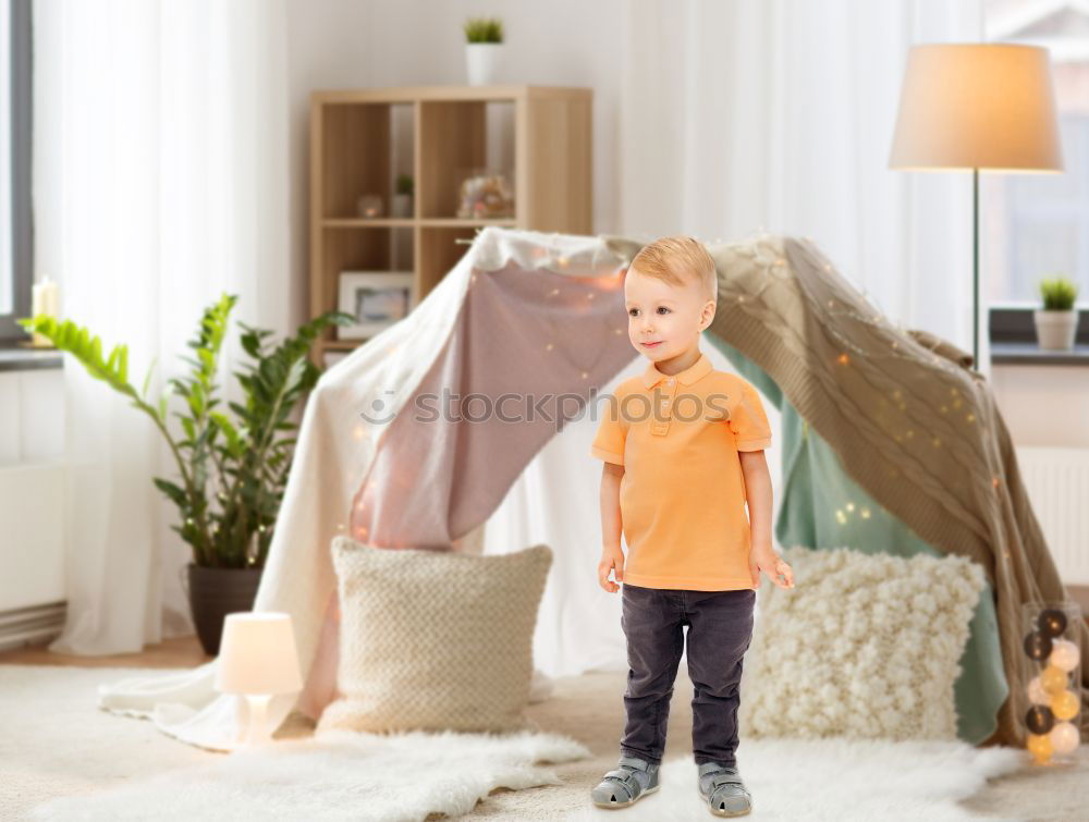 Similar – Image, Stock Photo Little boy sitting on the bed and smile