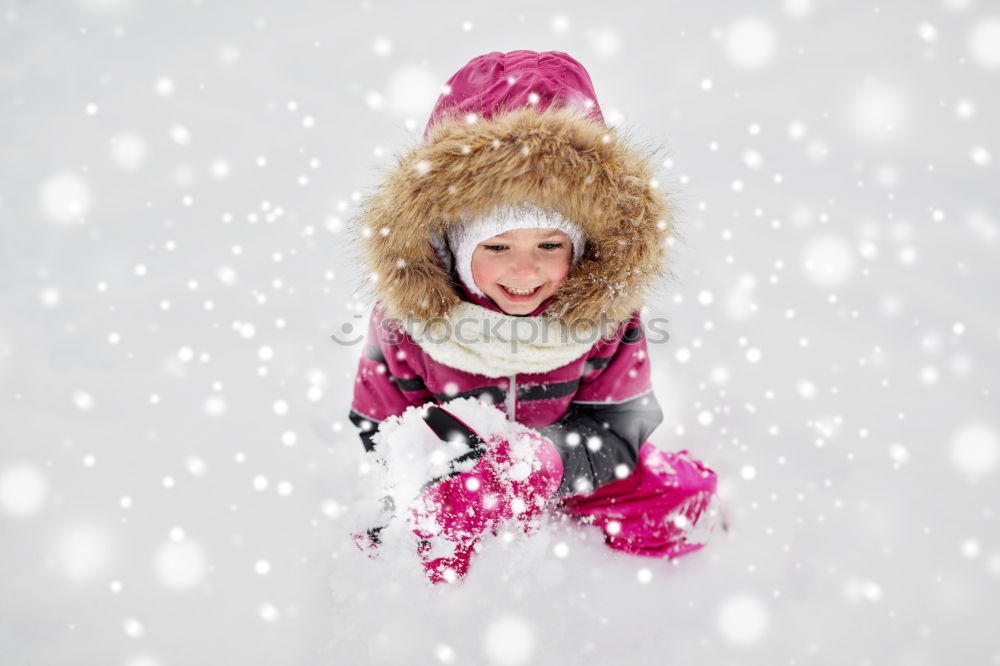 Similar – happy child girl skiing in winter snowy forest